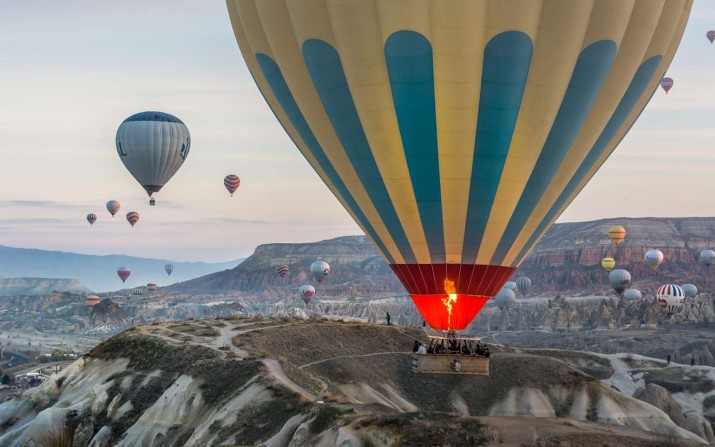 Enjoy a romantic balloon ride in Cappadocia, offering a breathtaking and unforgettable experience for couples with stunning sunrise views