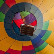 Experience the thrill of a group hot air balloon tour in Cappadocia, floating over stunning landscapes at sunrise, perfect for friends and families