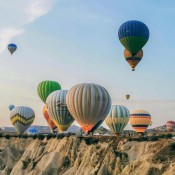 Experience the magic of Cappadocia with a balloon ride, offering stunning views of the landscape and unique rock formations at sunrise